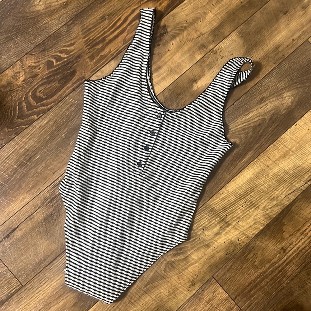 Black and white striped body suit